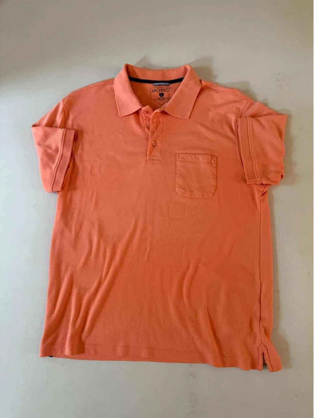 Architect brand short sleeve polo, coral colored size large